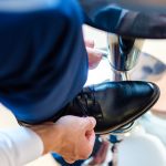 blue pants and black shoes